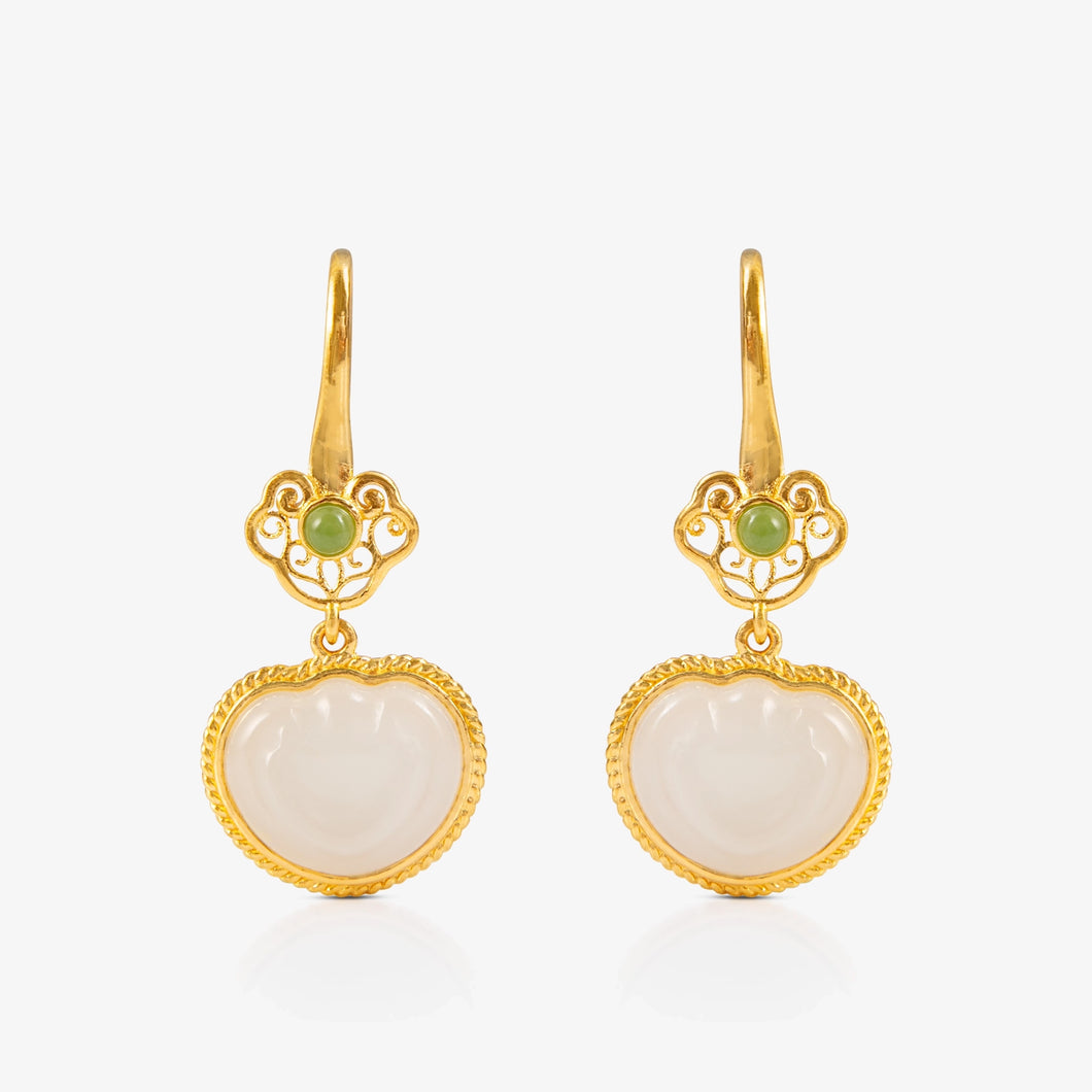 Nephrite and 24K Gold Ruyi Earrings featuring intricate design with a white nephrite heart-shaped pendant and delicate green jade accents, suspended from 24K gold.