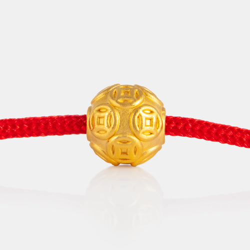 24K Gold Money Ball Charm on a red knot bracelet