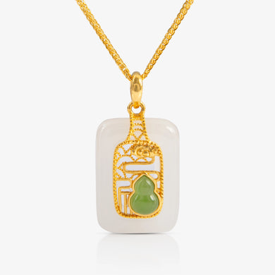 Nephrite and 24K Gold Filigree Hulu Tag Pendant featuring a delicate hulu motif framed by intricate gold filigree.