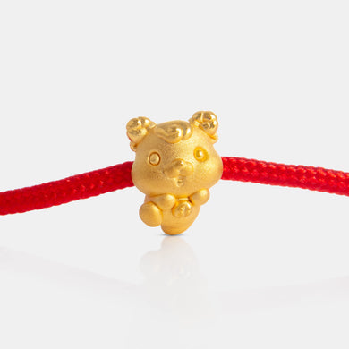 24K Gold Sheep Charm on a red knot bracelet