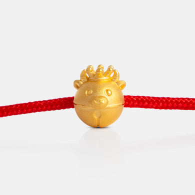 24K Gold Ox Charm on a red knot bracelet