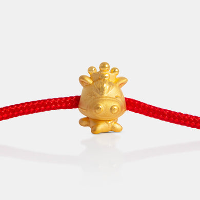 24K Gold Ox Charm on a red knot bracelet