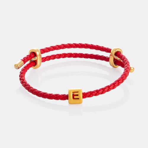 24K Gold Letter E Charm on red leather bracelet