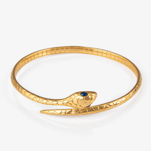Sculpted snakehead design with enamel eye on Lao Feng Xiang 24K gold bangle Detailed scale texture and mirror-polished finish on 24K gold serpent bangle