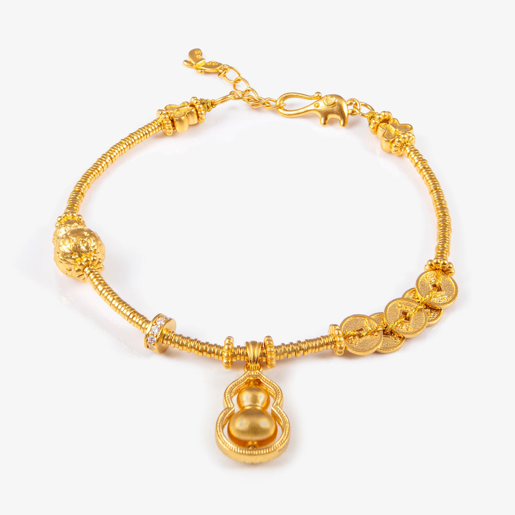 24K Antique Gold hulu and ancient coin line bracelet with natural diamond accents and sculpted detailing