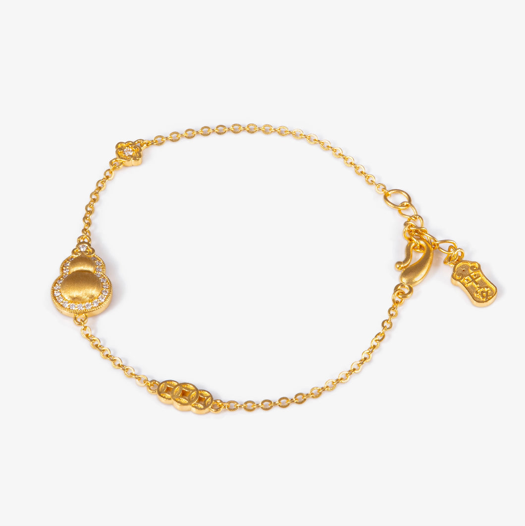 24K Antique Gold brushed hulu line bracelet with natural diamond accents and sculpted form