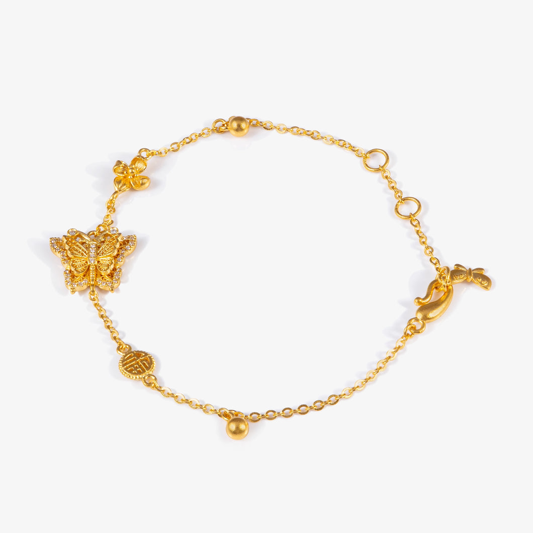 24K Antique Gold filigree butterfly line bracelet with natural diamonds and sculpted detailing