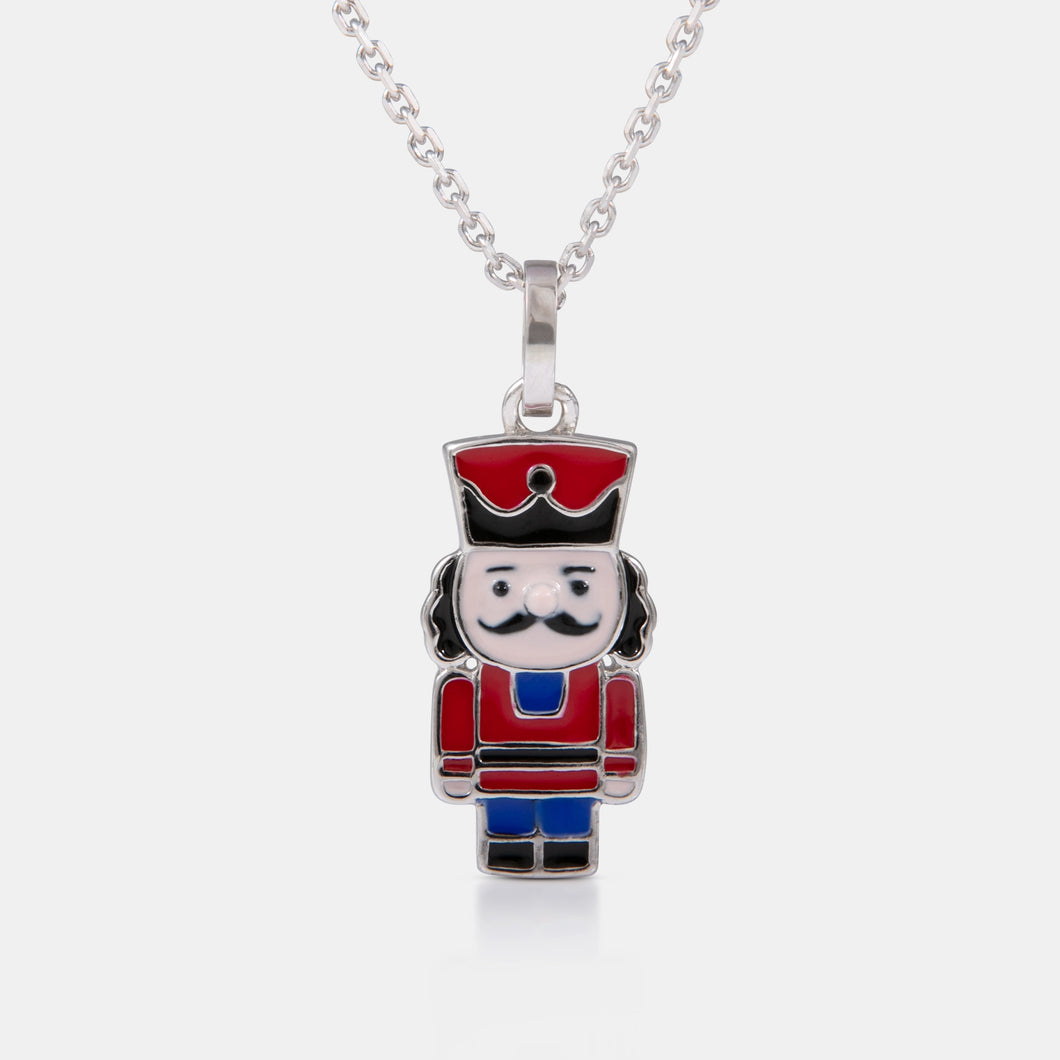 Sterling silver mini nutcracker necklace front view — red and blue enamel outfit and black and red enamel hat