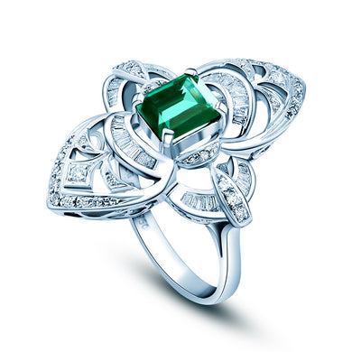 Oval Emerald and Mixed Cut Diamond Ring
